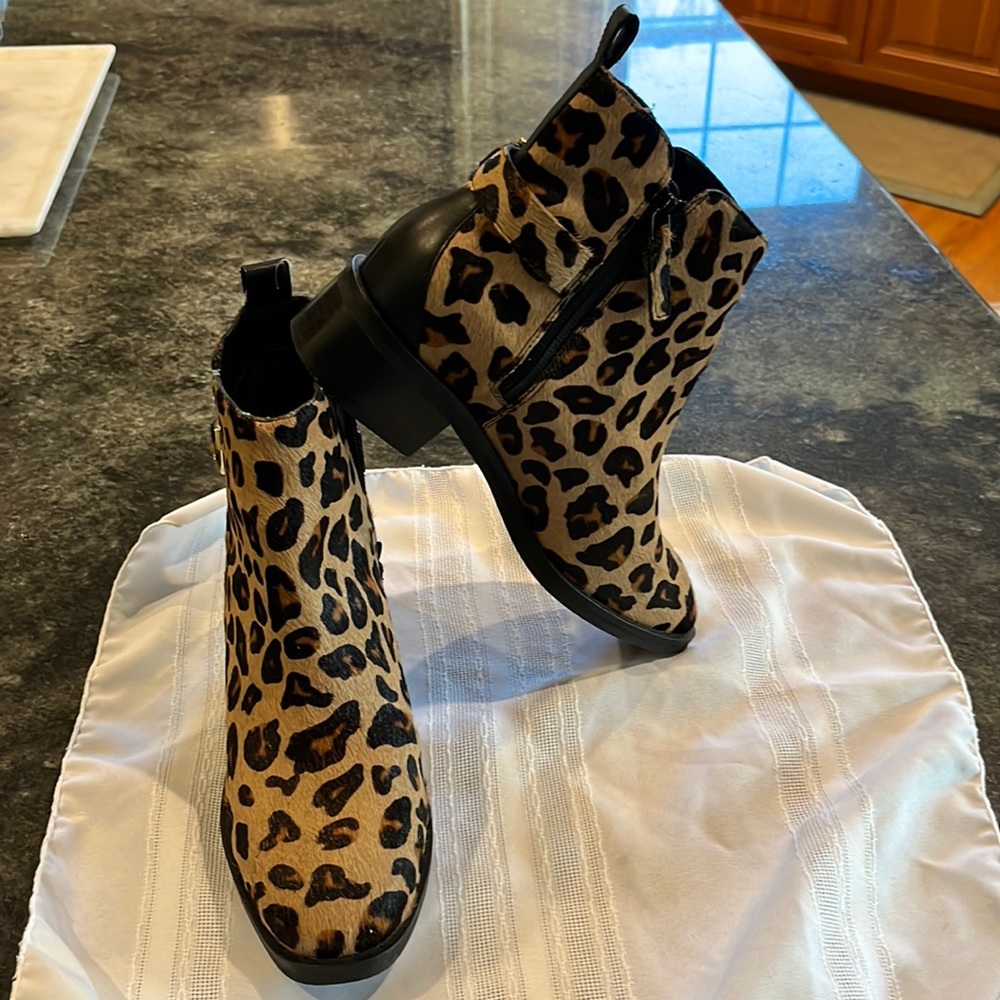 Cole Haan ankle boots. Beautiful detailed side zipper, side buckle . Worn once.